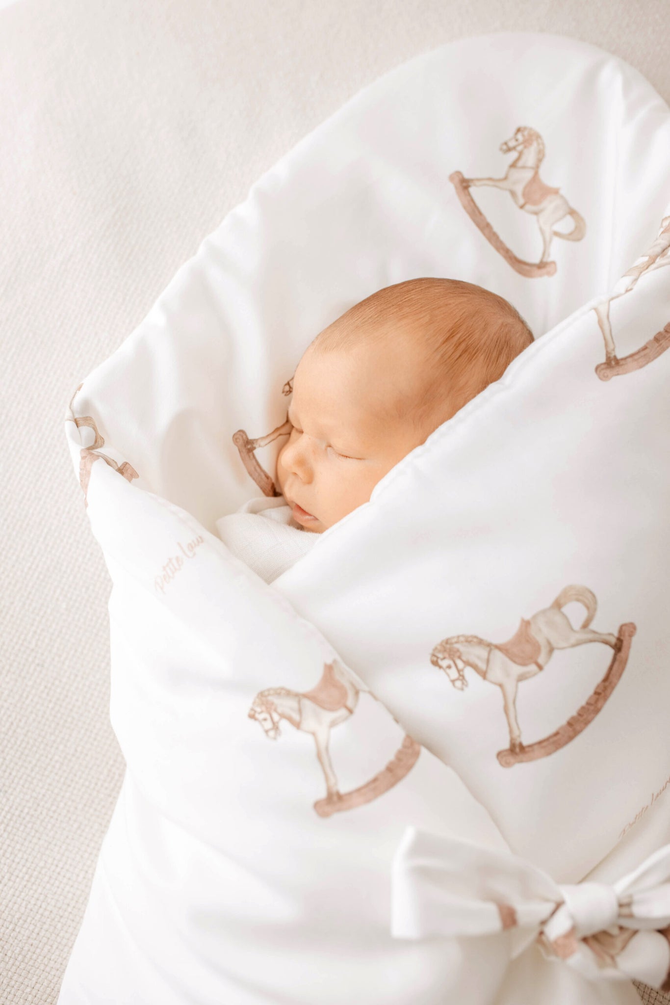 Petite Laure Pink Rocking Horse Baby Wrap