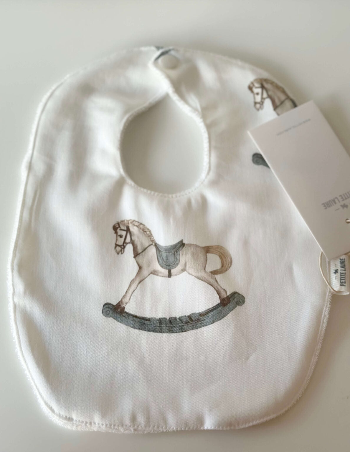 Petite Laure Blue Rocking Horse Bib